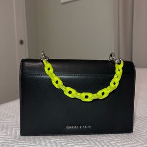 small bag with neon handle